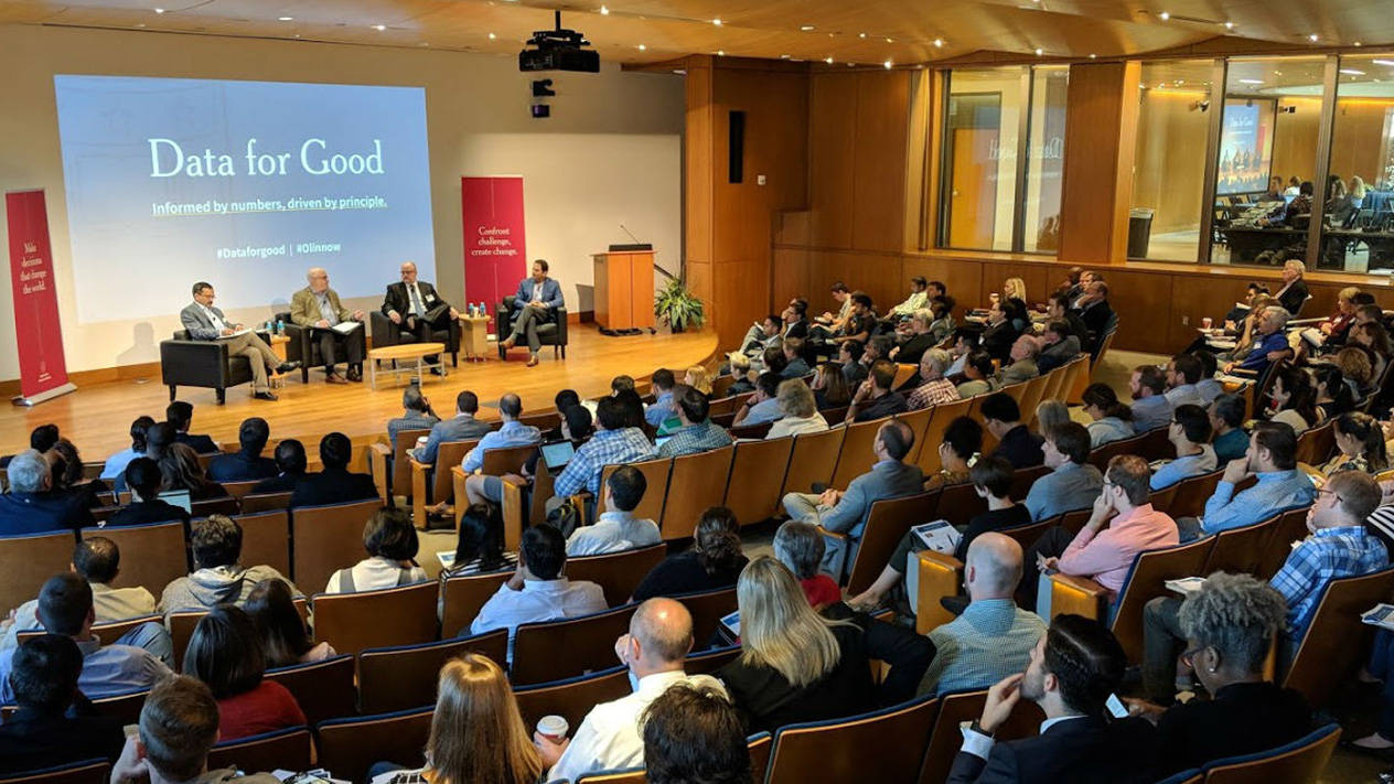 CABI's Data for Good conference, including stage participants and audience members.