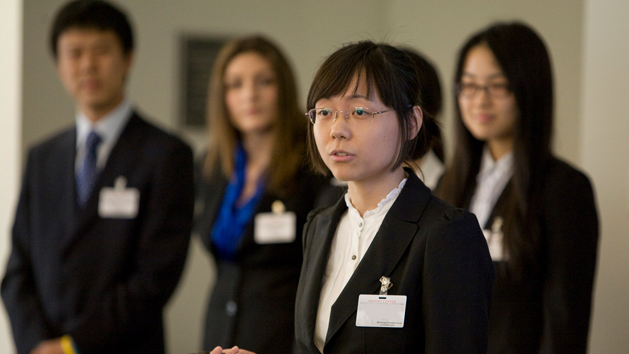 Students giving a finance presentation