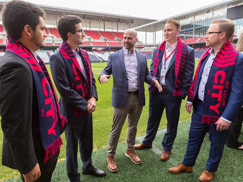 student consulting team on the field of St. Louis City soccer club