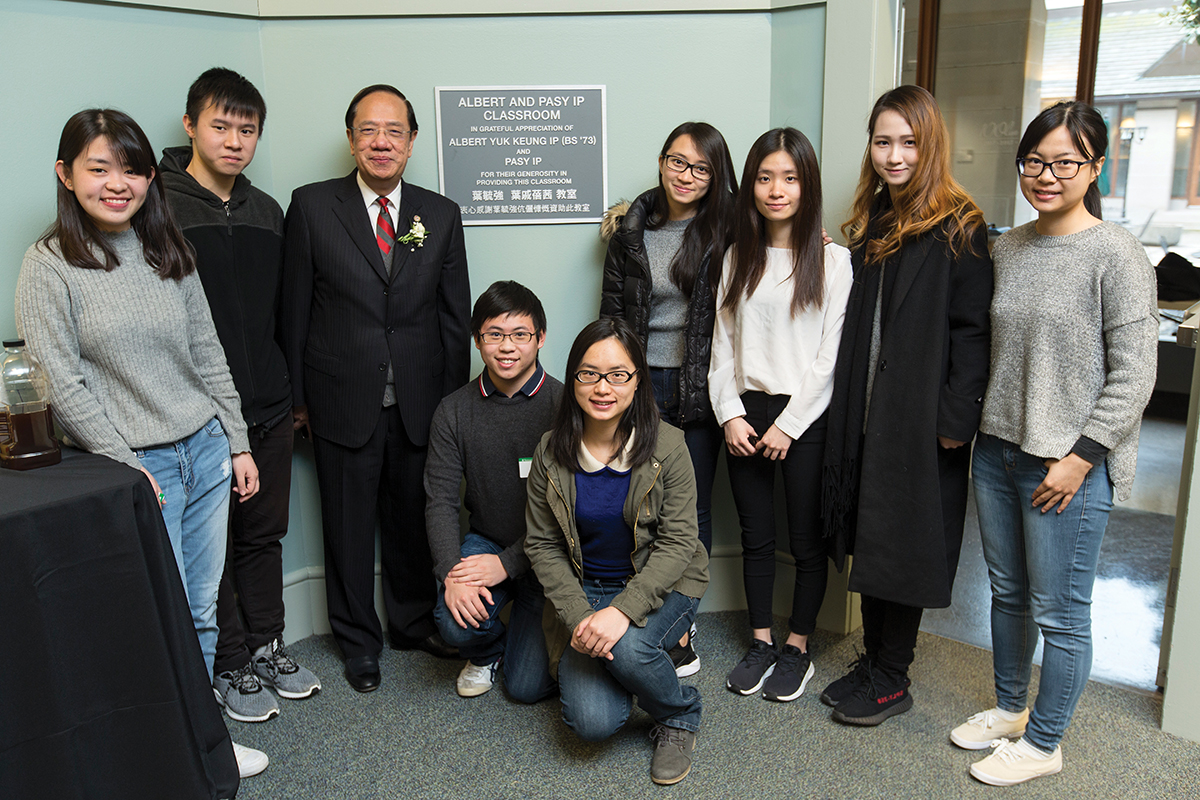 Albert Ip, (third from left) BS ’73, at the dedication ceremony for the Albert and Pasy Ip Classroom in Olin’s in Simon Hall in March. ©Photo by Jerry Naunheim