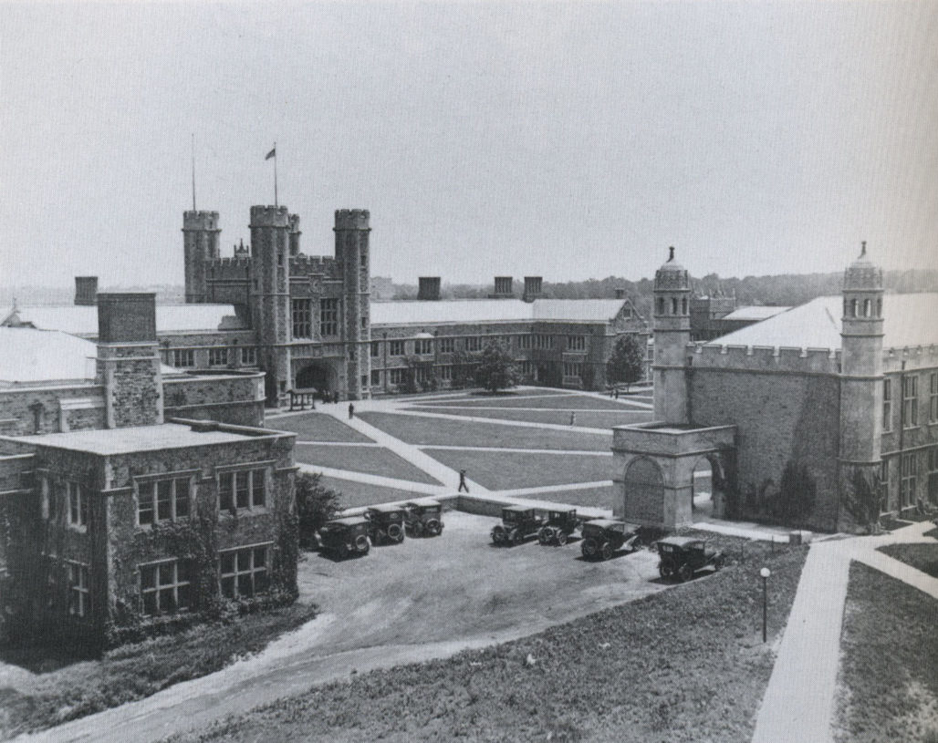First parking lot on the Danforth Campus was on the site where Duncker Hall would be built in 1920 to house the business school.