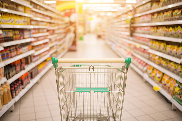 Photo of a shopping cart in a supermarket - stock photograph