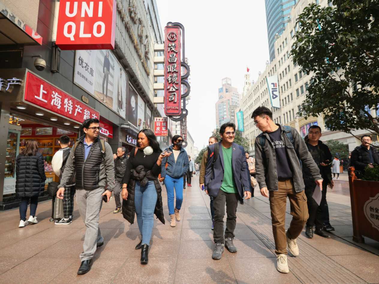 Students tour the famous Nanjing Road shopping district, where they compared retail strategies for a variety of garment retailers.