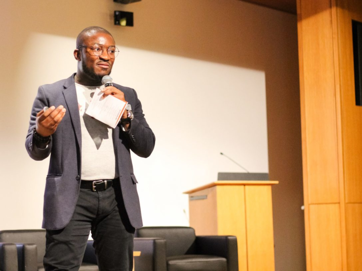 Ony Mgbeahurike, president of the Olin Africa Business Club, opens the forum on April 19.