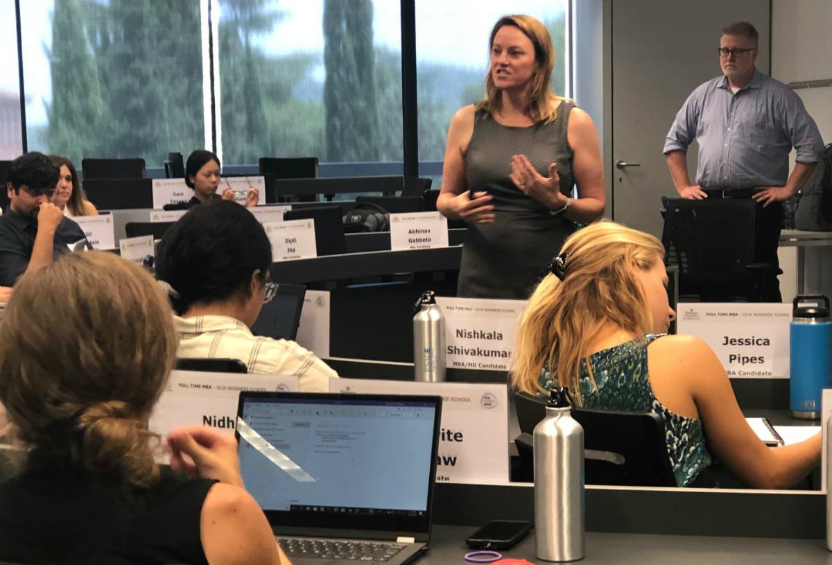 Students listen as WCC Director Jen Whitten discusses the importance of competitive advantage in all stages of your career during the students’ immersion in Barcelona in July 2019.