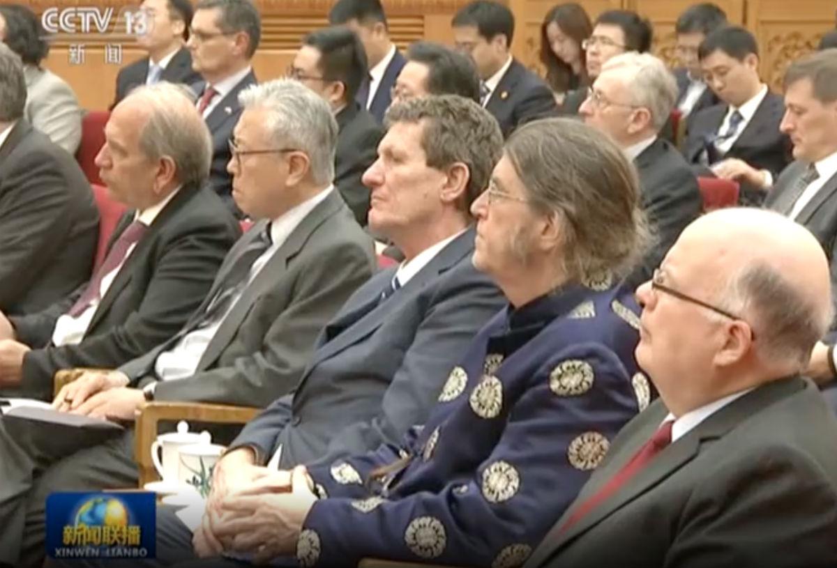 Olin’s Phil Dybvig (blue patterned jacket) in a screen grab from Chinese state television covering a January 2020 symposium with Chinese Premier Li Keqiang with academics working in the country.