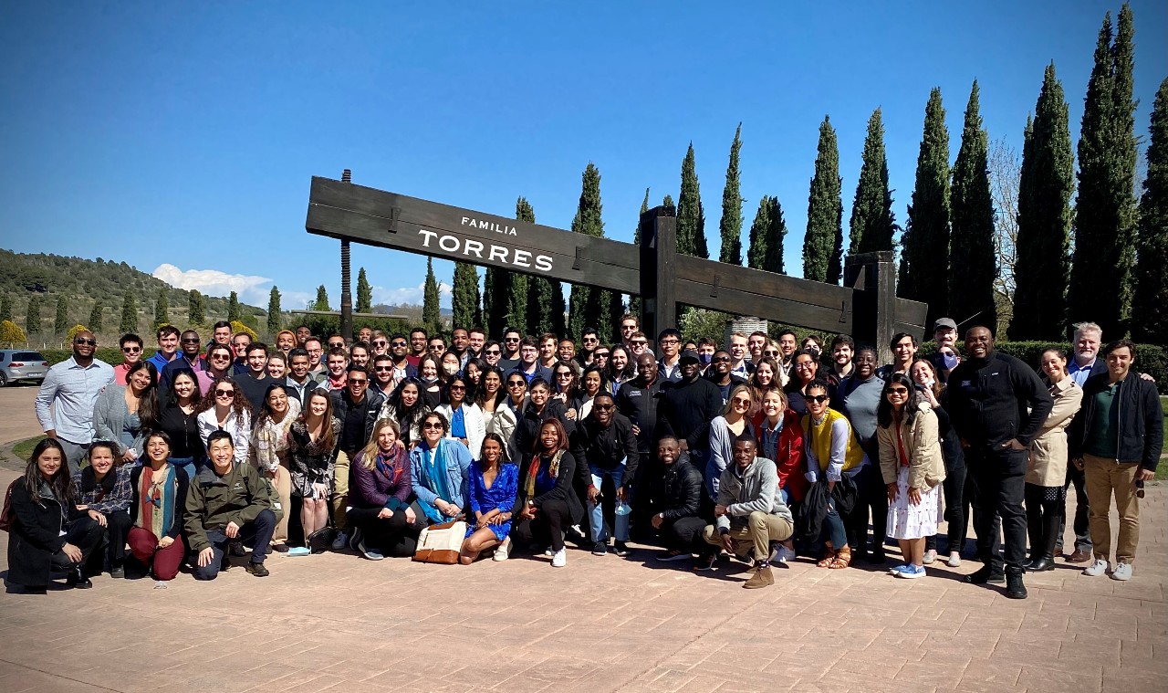 Student outside Barcelona in a group at a winery during their global immersion.