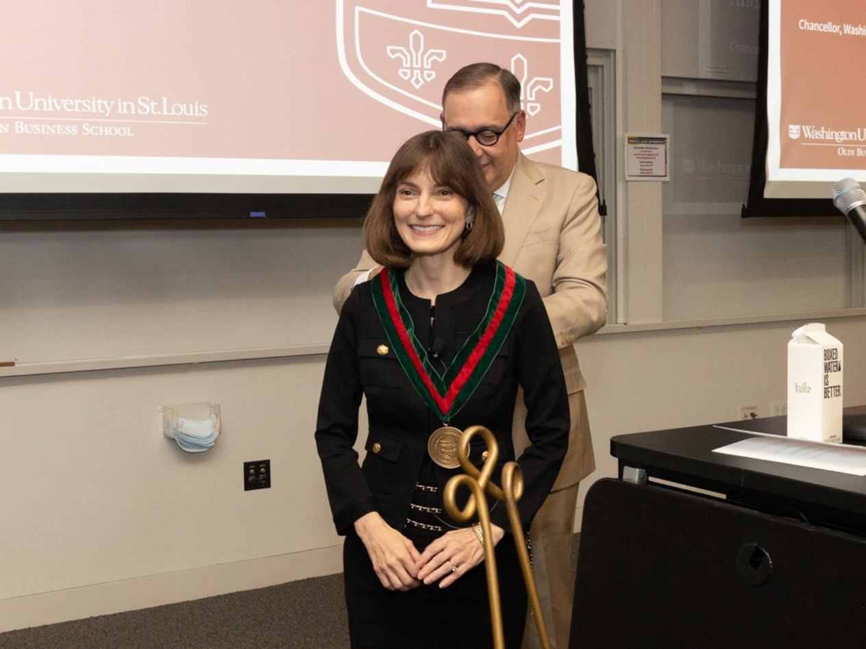 Martin presents LeBoeuf with a medal signifying her installation.