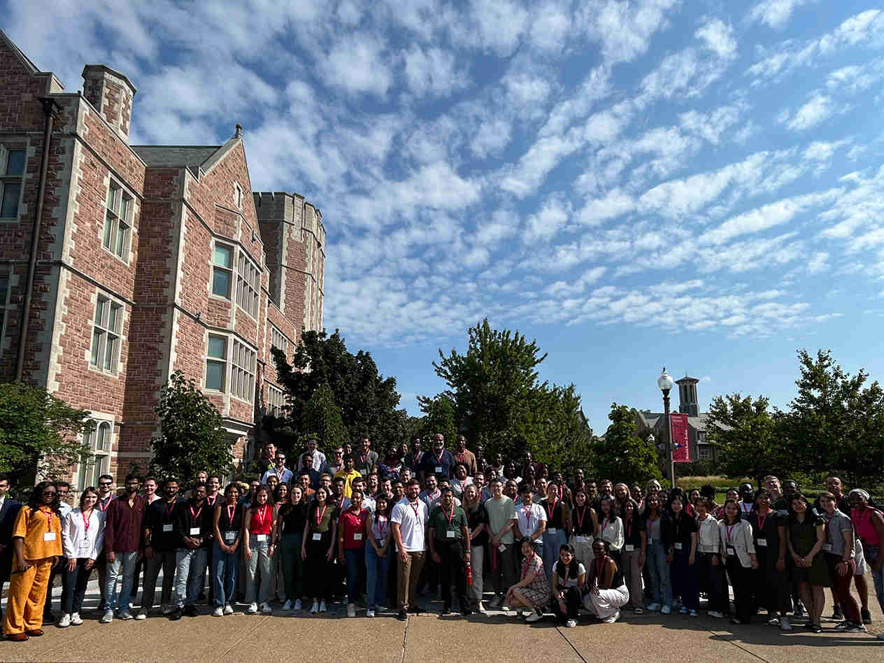 students standing outside on the WashU campus in St. Louis