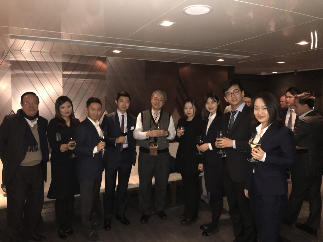 Students with Albert Ip at a happy hour event during their January career trek visit to Hong Kong.