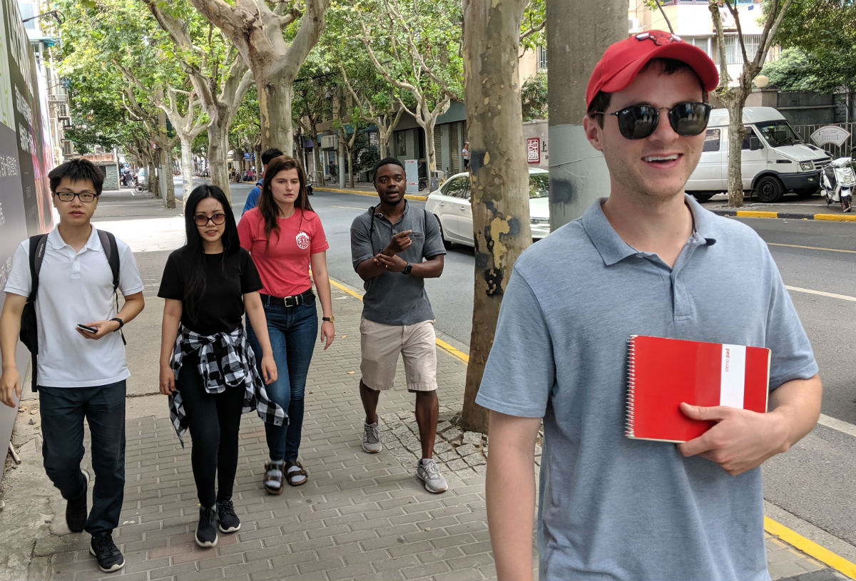 Zach Frantz, MBA ’21, with his teammates in Shanghai collecting data on potential Chinese competitors to Strange Donuts for their business models course.