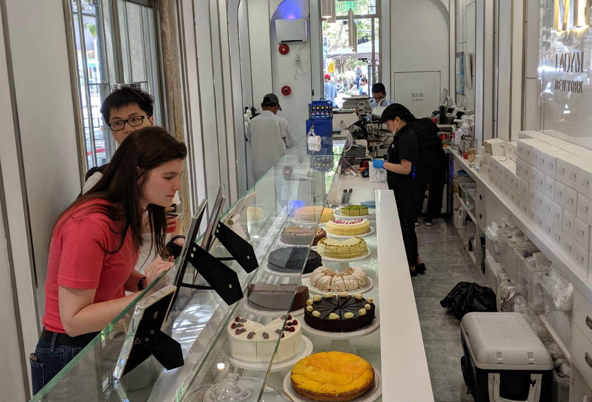 Susie Bonwich at a pastry shop in downtown Shanghai, collecting data to use in a recommendation: Should Strange Donuts enter the Shanghai market?